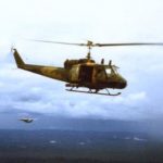 A Forward Air Controller and a 20th SOS helicopter on their way to an extraction (© Jim Green 20th SOS)
