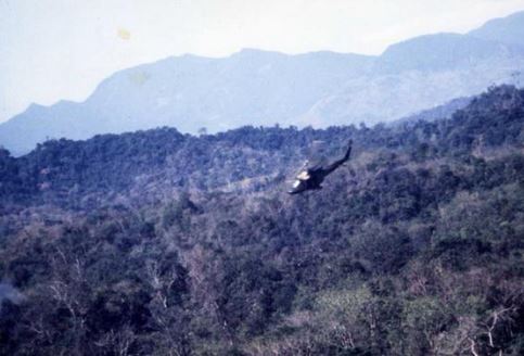 A Gunship attacks (note wisping smoke in the bottom left hand corner of the photo). (© Jim Green 20th SOS)