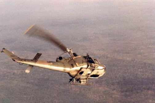 A Huey of the 20th Special Operations Squadron starts its descent (© Jim Green 20th SOS).